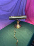 Vintage adjustable brass banker’s piano desk lamp with classic design, sturdy brass construction, and adjustable arm—perfect for desks, pianos, or reading areas.