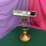 Vintage adjustable brass banker’s piano desk lamp with classic design, sturdy brass construction, and adjustable arm—perfect for desks, pianos, or reading areas.