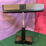 Vintage 1970s-1980s faux woodgrain fluorescent desk lamp with retro design, wood-look finish, and soft even lighting—perfect for workspaces and home offices.