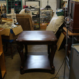 Solid mahogany wood end table with rich wood grain and classic design