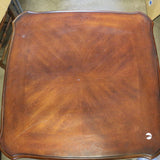 Solid mahogany wood end table with rich wood grain and classic design