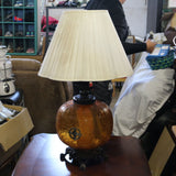 Vintage amber glass table lamp with a warm glow and retro charm