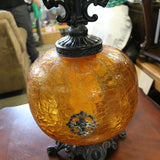 Vintage amber glass table lamp with a warm glow and retro charm