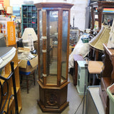 Vintage mahogany glass curio cabinet with mirrored back and glass shelves