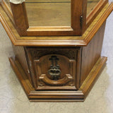 Vintage mahogany glass curio cabinet with mirrored back and glass shelves