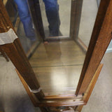 Vintage mahogany glass curio cabinet with mirrored back and glass shelves