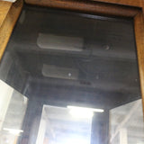 Vintage mahogany glass curio cabinet with mirrored back and glass shelves