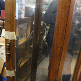 Vintage mahogany glass curio cabinet with mirrored back and glass shelves