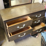 Vintage wood dresser with drawers and rectangular mirror attached