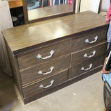 Vintage wood dresser with drawers and rectangular mirror attached