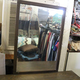 Vintage wood dresser with drawers and rectangular mirror attached