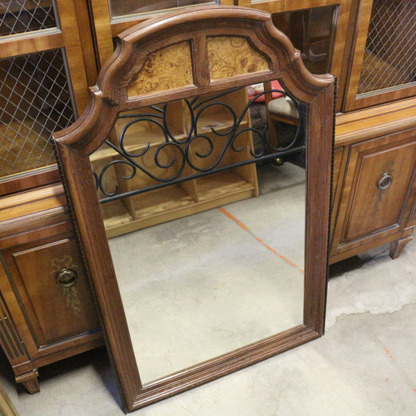 Vintage wood framed mirror with burlwood and iron scrollwork accents
