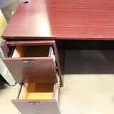Credenza desk with right corner extension and enclosed storage