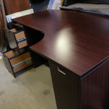 Credenza desk with right corner extension and enclosed storage