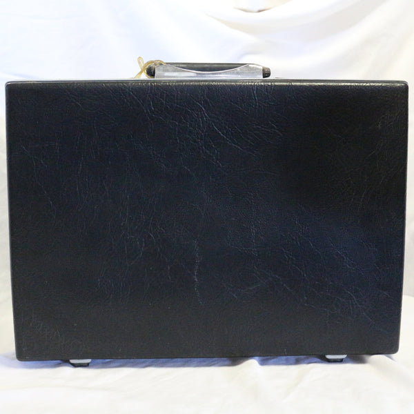 Vintage gray Samsonite hard shell briefcase with snap lock and key