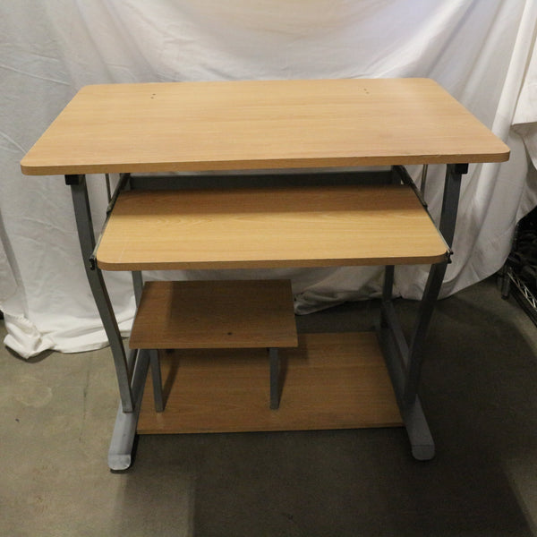 Modern light brown computer desk with keyboard tray
