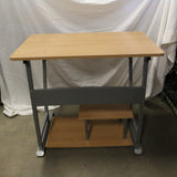 Modern light brown computer desk with keyboard tray