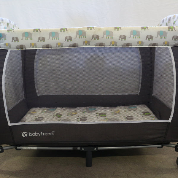 Baby Trend portable infant playard with elephant print mattress and mesh sides