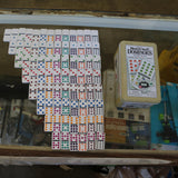 Cardinal Mexican Train Dominoes game set in tin case with jumbo tiles