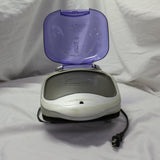 George Foreman compact purple electric grill with signature lid