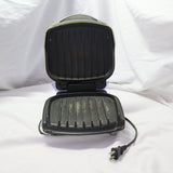 George Foreman compact purple electric grill with signature lid