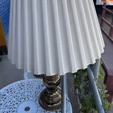 Vintage Stiffel brass table lamp with polished solid brass base, pleated fabric lampshade, and rotary knob switch—elegant and functional lighting for any space.