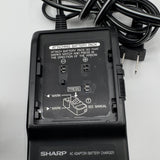 Sharp ViewCam VL-E39U 8mm Camcorder with 12x zoom, Hi-Fi audio, swivel LCD screen, battery packs, charger, and carrying bag.